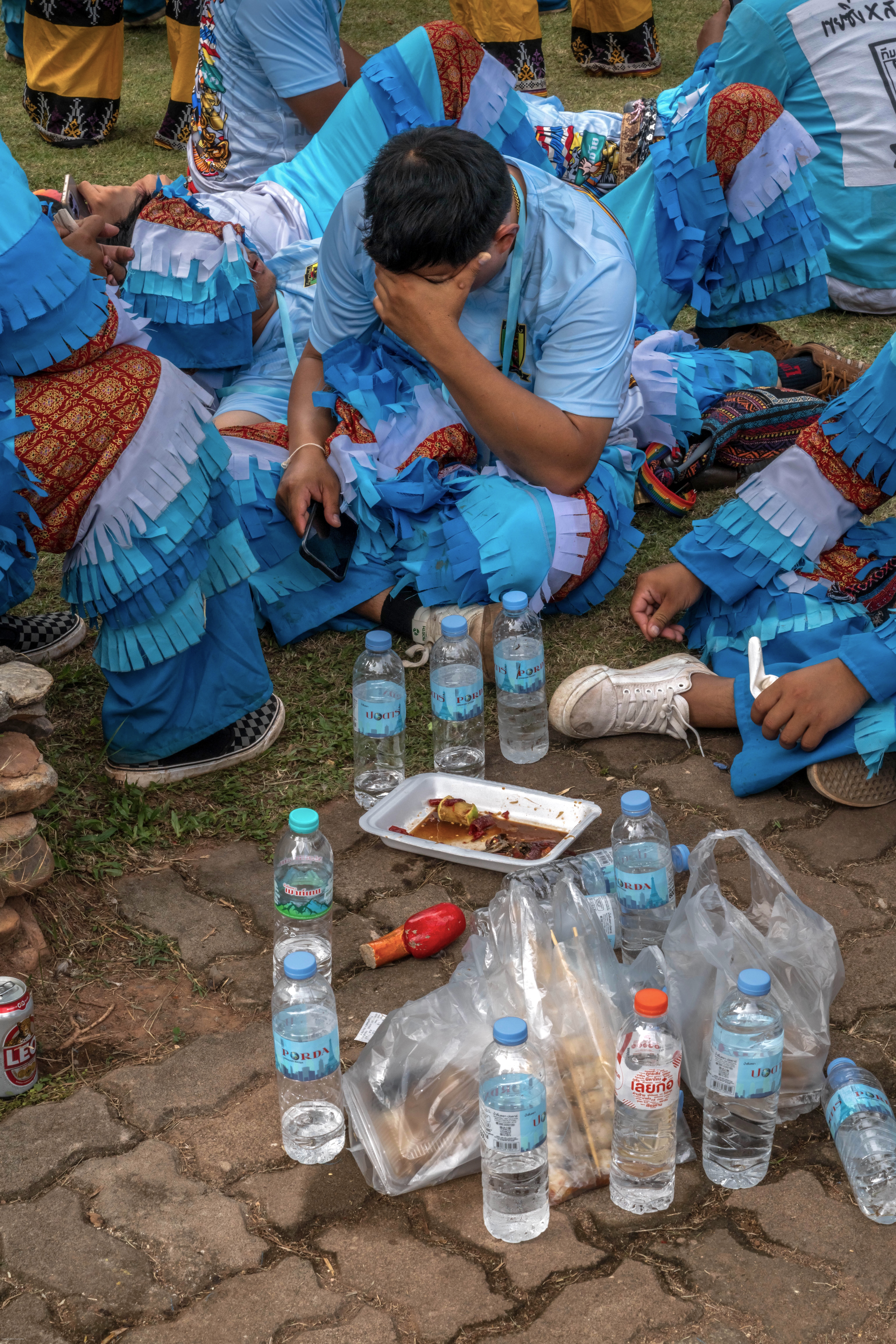 A group of Phi Ta Khon ghosts gathered when the parade is done. 
